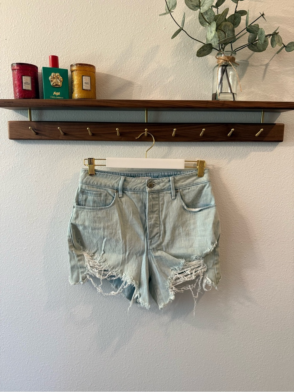 Good American Light Wash Distressed Denim Shorts